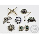 A selection of vintage brooches and earrings, to include a garnet topped doublet garland brooch,