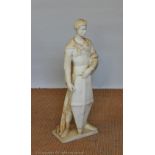 A 19th century carved alabaster figure of St George on rectangular base,