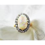 An opal and diamond cluster ring,