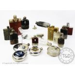 Six assorted glass and leather clad hip flasks,