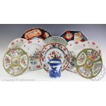 Four 19th century Chinese famille rose export porcelain plates, 24cm diam, with three other plates,