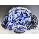 A selection of flow blue Staffordshire Berry pattern dinner wares comprising,