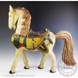A 19th century style carved wood carousel type horse,