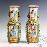 A pair of late 19th century Chinese porcelain, Cantonese famille rose vases,