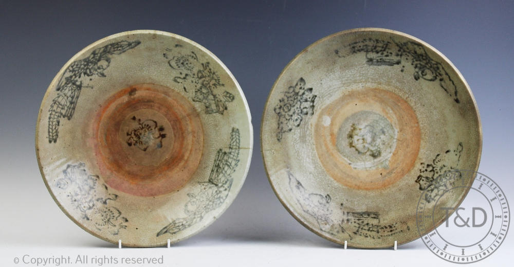 Two late 19th century Chinese 'Kitchen Ming' provincial dishes, decorated with birds and flowers,