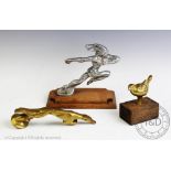 Three car mascots, comprising, a leaping greyhound, 20cm long, a leaping Indian chief,