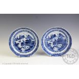 A pair of 19th century Chinese blue and white saucer dishes, 23.