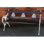 A Coalbrookdale style garden bench, late 20th century, with foliate detailing,