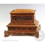 An Anglo Indian carved sandalwood table top casket,