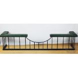 A Victorian style club fender, with green leatherette upholstery on plinth base,
