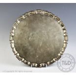 A silver presentation salver, Barker Ellis Silver Co, Birmingham 1976,