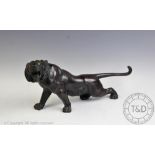 A contemporary Chinese bronze model of a tiger, modelled standing fiercely roaring, unsigned,