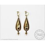 A pair of Victorian yellow metal drop earrings,
