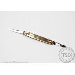 A 9ct gold and stainless steel pocket fruit knife, Sheffield 1977, engraved, 'To Rex from Kiddie',