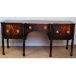A William IV inlaid mahogany break front sideboard,