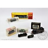 A selection of seven N gauge model trains, to include a Fleichmann 7000 and a Hornby Minitrix N.