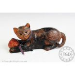 A Bretby Pottery terracotta model of a kitten playing with a ball of string, impressed mark to base,