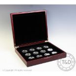A collection of twelve Solomon Islands silver proof twenty five dollar coins, 2005 and 2006,