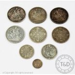 A collection of nine Victorian silver coins, comprising three crowns 1887 x3 and 1893,