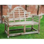 A pair of Lutyens type garden benches,