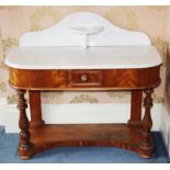 A Victorian marble top Duchess type wash table