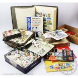 A large collection of assorted stamps to include; world stamps,