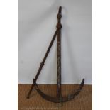 A cast iron ships anchor,