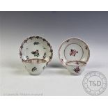 An 18th century English porcelain puce monchrome teabowl and saucer,