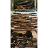 A collection of vintage hand and agricultural tools,