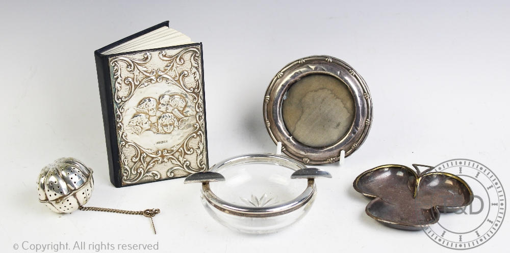 A selection of silver, to include, a silver mounted address book,