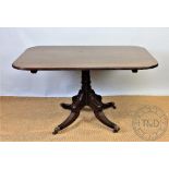 A Regency inlaid mahogany rectangular breakfast table,