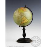 A Philips 6 inch terrestrial globe, on ebonised stand, 27.