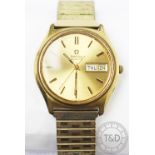 A gentlemans gold plated Omega wristwatch, baton dial with date and day apertures,