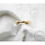 A 22ct gold band, 2.