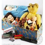 A selection of toys, to include; a golden plush teddy bear with growler and articulated rims,