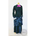 A dark green wool and silk mix dress, circa 1880,