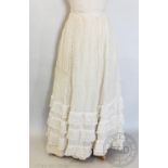 An ivory silk skirt/petticoat, circa 1908,