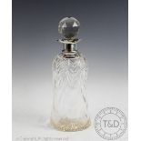 An Edwardian silver mounted cut glass decanter and stopper, Birmingham 1905,