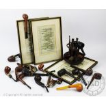 A miscellaneous selection of smoking pipes,