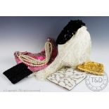 A ladies bright pink shoulder bag, highly embellished with silver coloured beads and sequins,
