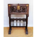 A 17th century style Spanish carved walnut vargueno on stand, 19th century,