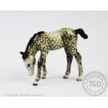 A Beswick foal grazing, model number 946, designed by Arthur Gredington, second version,