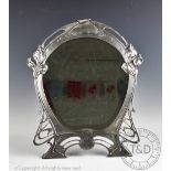 A German Art Nouveau style mirror in the manner of WMF,