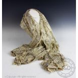An Art Deco Assuit Egyptian gilt metal thread cream shawl, woven with geometric designs,