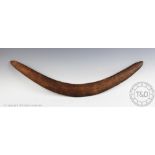 An Australian Aboriginal tribal art carved wooden Central Dessert hunting boomerang,