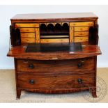 An early 19th century mahogany bow front secretaire chest,