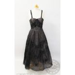 A vintage 1950's evening dress, bearing label for 'Laura Phillips',