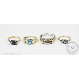 A topaz set ring in yellow metal setting, along with a white metal ring setting stamped '14K',