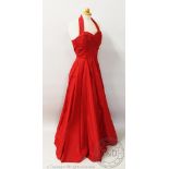 A vintage 1950's red taffeta evening gown,