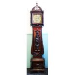 A late 19th / early 20th century century continental carved walnut and stained wood eight day